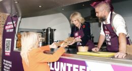 Queen Camilla tucks into a tuna mayo potato with viral sensation Spudman at Clarence House - after her son Tom Parker Bowles gave his food glowing reviews