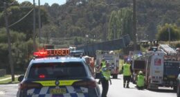 Police on scene at a bridge collapse in Lithgow after it was struck by a truck.