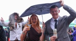 Revellers stumble out of the gates at Flemington after Melbourne Cup