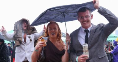 Revellers stumble out of the gates at Flemington after Melbourne Cup
