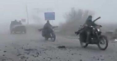 Russian column travelling in stripped-back cars advances through fog