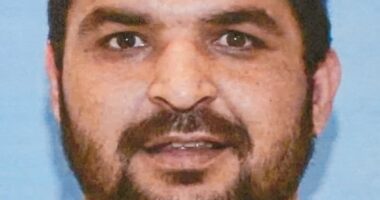 Seemingly quiet life of DC National Guard shooting suspect is revealed