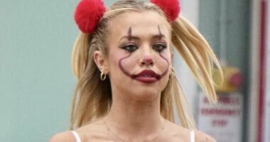 Tammy Hembrow turns heads while taking her kids trick-or-treating