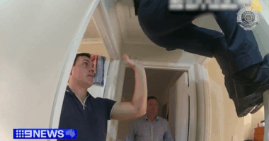 Queensland Police were forced to drag the teen from the roof cavity to arrest him.