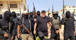 The clan boss leading the fight against Hamas in Gaza: Militia leader says thousands living under terror group's rule want them overthrown - and says they are to blame for 'every dead woman and child', NOT the IDF