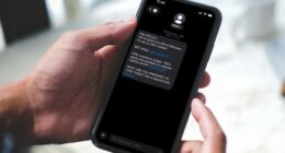 A phone showing a text from a gambling company to a customer.