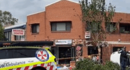 Three men are fighting for their lives after they were hit by a car that crashed and mounted the curb outside an Indian restaurant in Sydney's west.