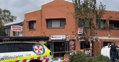 Three men are fighting for their lives after they were hit by a car that crashed and mounted the curb outside an Indian restaurant in Sydney's west.