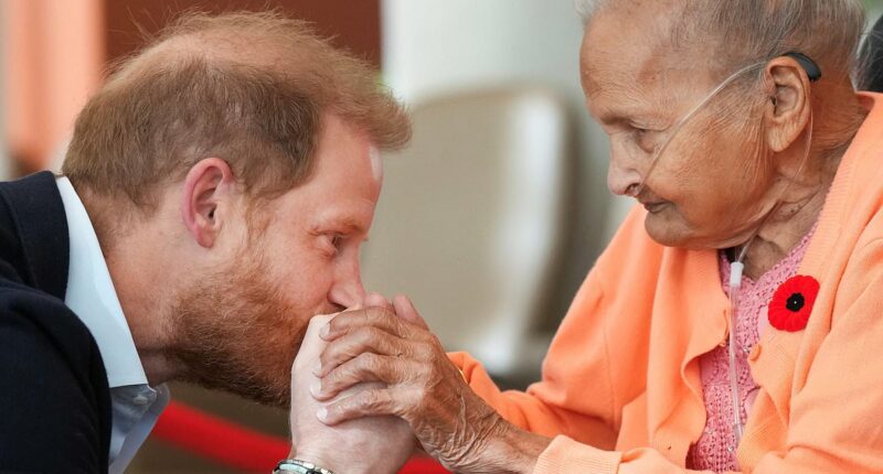 Touching scenes as Prince Harry meets some of Canada's oldest veterans and kisses 91-year-old's hand - as well as collecting yet another team's baseball cap