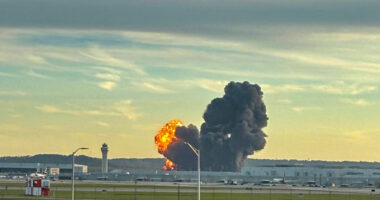 UPS plane crash: Officials scour charred site of Kentucky crash for victims and answers