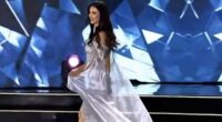 Ukrainian beauty queen takes a tumble as she's introduced on stage
