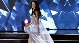 Ukrainian beauty queen takes a tumble as she's introduced on stage