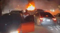 Video shows wild neighborhood street takeover as violent mob pummels couple, burns truck