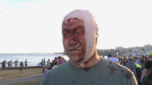 'An absolute massacre': Man injured in Bondi Beach shooting tells of chaos
