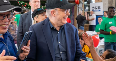 Albanese shared photos of himself serving Christmas lunch at Bill Crews and the Exodus Foundation with NSW Premier, Chris Minns.