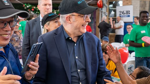 Albanese shared photos of himself serving Christmas lunch at Bill Crews and the Exodus Foundation with NSW Premier, Chris Minns.