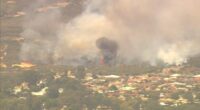 A bushfire burning in Kenwick, in Perth's east.