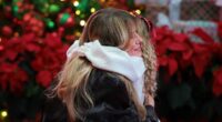 Adorable moment Melania hugs five-year-old patient as she celebrates Christmas at children's hospital