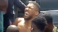 Anthony Joshua to spend New Year's Eve in luxury Nigerian hospital recovering from crash that killed his two friends - as police say tyre blowout caused high-speed wreck