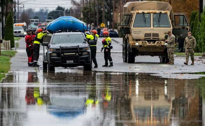 Arctic air plunges south as residents of the Pacific Northwest remain on guard after severe flooding