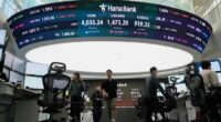 Asian shares, US futures sink ahead of US jobs report