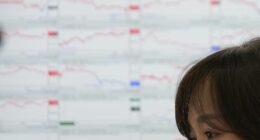 Asian shares are mixed, while gold and silver hit record highs