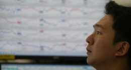 Asian shares follow Wall Street lower as AI worries drag tech stocks lower