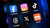Toronto, Canada - August 22, 2024:    Popular social media apps on an Apple iPhone: Facebook, Instagram, TikTok, Threads, X (formerly Twitter), and Reddit.