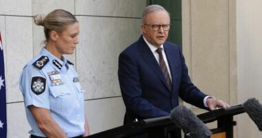 CANBERRA, AUSTRALIA - DECEMBER 19: Australian Prime Minister Anthony Albanese and Australian Federal Police Commissioner Krissy Barrett on December 19, 2025 in Canberra, Australia. Albanese held the press conference as the government comes under pressure over the recent Bondi mass shooting, promising to tighten gun laws across the country.