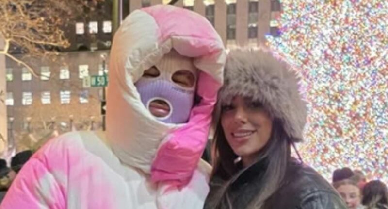 Brazilian star Neymar catches the eye by wearing £4,300 pink and white coat and purple ski mask on Christmas trip to New York