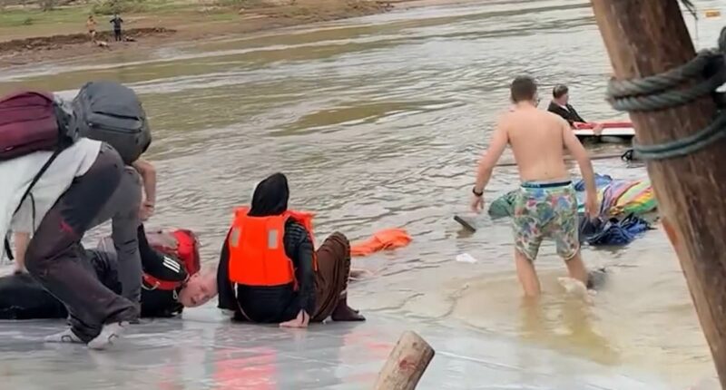 British tourists among more than 100 rescued as ferry capsizes in Laos