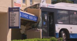 A bus has crashed into the side of a medical centre after a collision with a car in Sydney's north-west.
