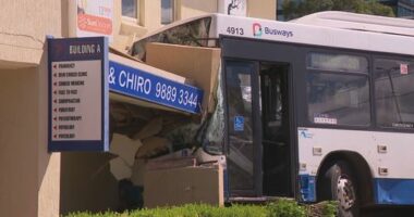 A bus has crashed into the side of a medical centre after a collision with a car in Sydney's north-west.