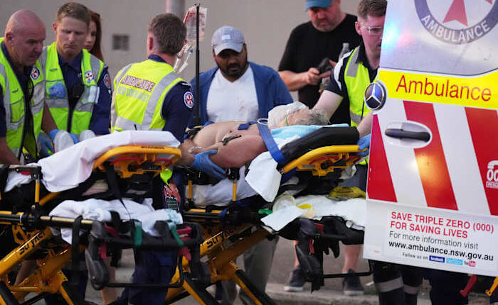 Bystander shown in videos disarming gunman during Australian beach shooting commended for bravery