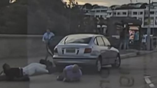 Bystanders shown fighting with accused Bondi gunmen in new footage