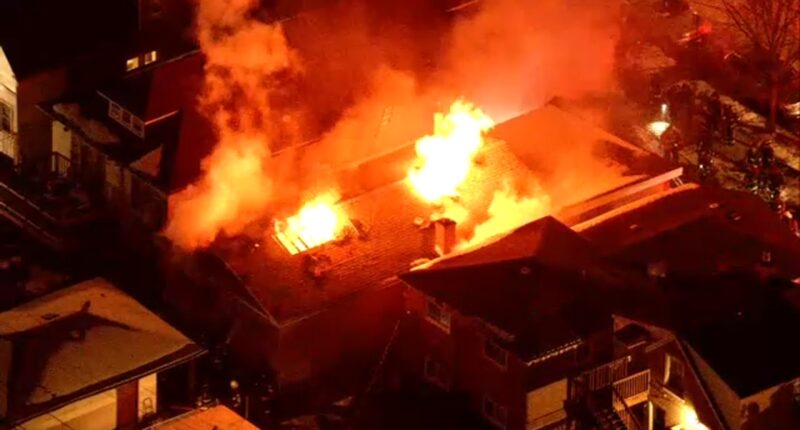 Chicago firefighters battle large house fire on South Lafayette Avenue on South Side