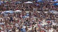 Christmas Day tensions rise as revellers urged to avoid Aussie beach