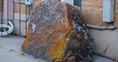 Church repatriates sacred rock covered with petroglyphs after 14-year effort