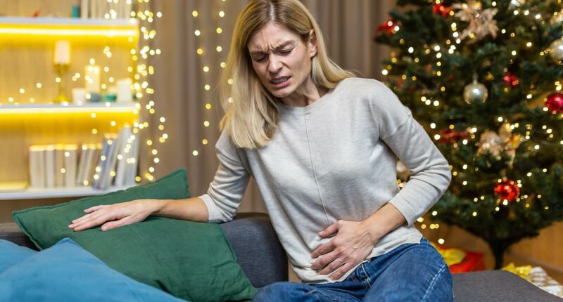 Don't let Christmas lunch derail your entire day: Experts reveal how to banish festive indigestion and painful bloating FAST... without popping pills