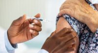 Everyone who can get flu vaccine as NHS warns of infection 'tidal wave'