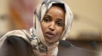 Exposed: Tim Walz and Ilhan Omar Caught Posing in Photos with Illegal Somali Fraudster