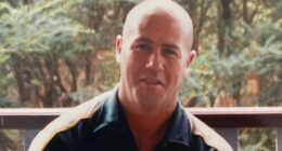 John Lohan died after he was crushed by a tree and suffered a heart attack while fighting a severe bushfire in Bulahdelah on the NSW Mid North Coast on Sunday night.