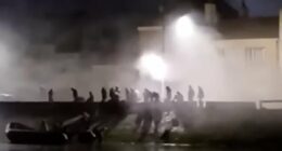 French police clash with migrants trying to launch boat near Calais