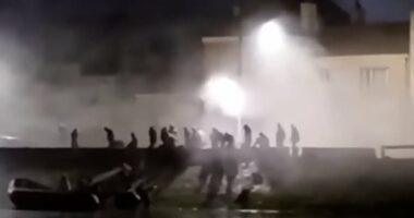 French police clash with migrants trying to launch boat near Calais