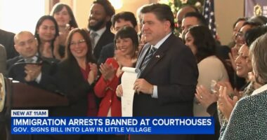 Gov. JB Pritzker signs HB 1312 creating legal protections for immigrants in Illinois at La Villita Community Church in Chicago