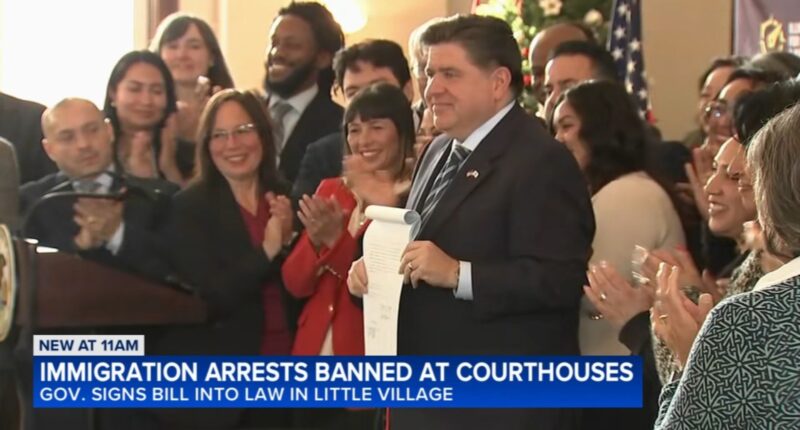 Gov. JB Pritzker signs HB 1312 creating legal protections for immigrants in Illinois at La Villita Community Church in Chicago