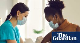 Health experts criticise NHS chief’s remarks that people with flu symptoms ‘must wear face masks’