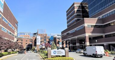 Hospitals enact visitor bans as 'super' virus overwhelms US healthcare systems