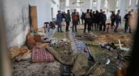 Hundreds mourn in Syria's Homs after deadly mosque bombing