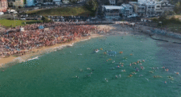 Hundreds of people paddle-out at Bondi Beach